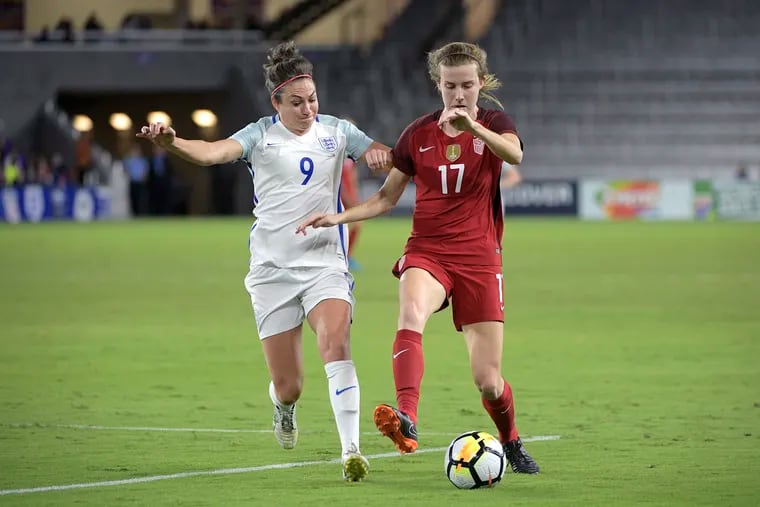 England forward Jodie Taylor (9) and United States defender Tierna Davidson battle for the ball during the first half of a SheBelieves Cup women's soccer match last March in Orlando. (AP Photo/Phelan M. Ebenhack)