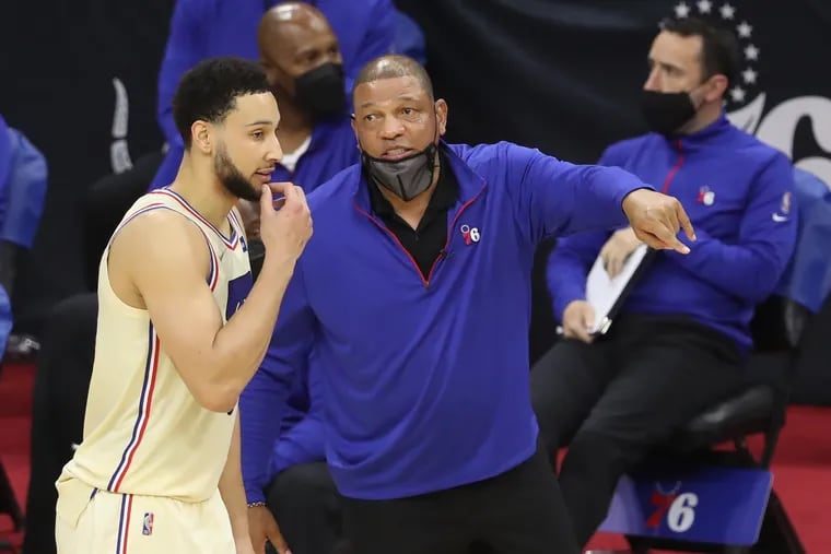 Ben Simmons (left) has a supporter in coach Doc Rivers (right).