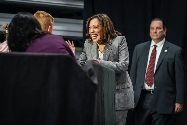 Vice President Kamala Harris greets audience members as she arrives at the Finishing Trades Institute in Philadelphia in August 2023. Local Democrats began to coalesce around Harris Sunday after President Joe Biden dropped out of the presidential race.