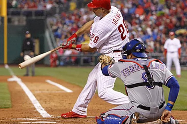 Raul Ibanez hit a solo home run in the fourth inning against the Rangers. (Ron Cortes/Staff Photographer)