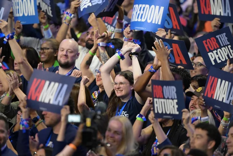 Democrats cheer during Michelle Obama’s remarks on Wednesday, Aug. 21, 2024, during the 2024 DNC in Chicago.