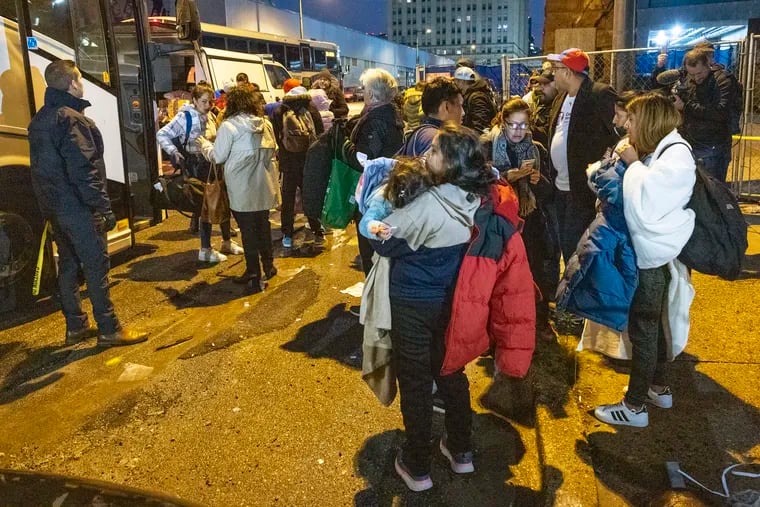 Philadelphia aid groups meet migrants as they arrive by bus from Texas to Philadelphia, Wednesday, Nov. 16, 2022. President Biden's new policy would restrict the ability of new migrants to apply for asylum.