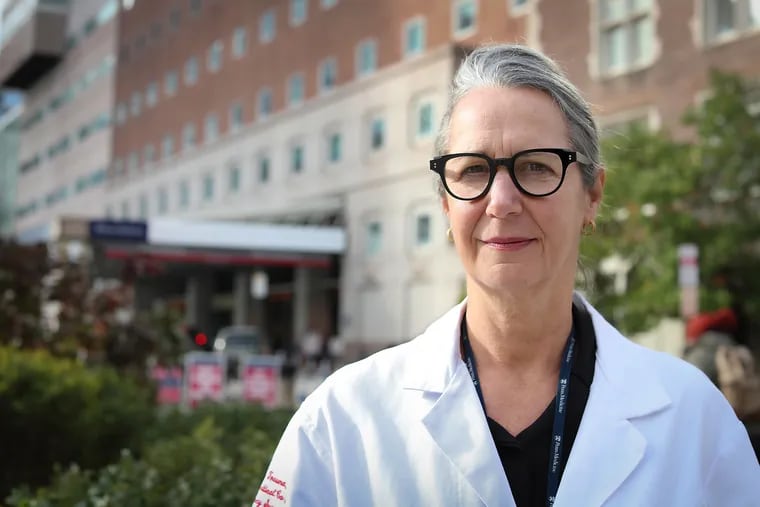Jo Buyske, the head of the American Board of Surgery and a co-author of the paper on gender discrimination of female surgical residents, poses for a portrait outside the Hospital of the University of Pennsylvania in Philadelphia, PA on November 14, 2019.