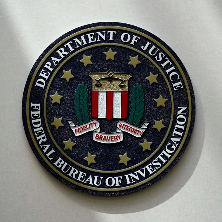 FILE - An FBI seal is seen on a wall on Aug. 10, 2022, in Omaha, Neb. An Idaho teenager is charged with attempting to provide material support to the terrorist group ISIS after prosecutors said he planned to carry out an attack on a Coeur d'Alene church. Alexander Scott Mercurio was arrested on Saturday, April 6, 2024, and the charges were unsealed in Idaho's U.S. District Court on Monday. (AP Photo/Charlie Neibergall, File)