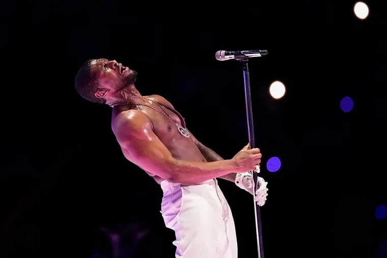 Usher performs during halftime of the NFL Super Bowl 58 football game Feb. in Las Vegas. He plays the Wells Fargo Center in South Philly on Friday and Saturday.