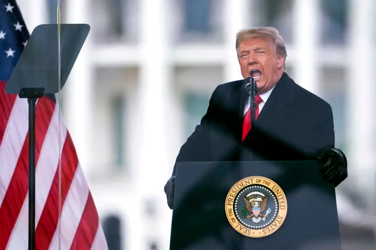 Donald Trump speaks during a rally protesting the Elector College certification of Joe Biden's win in the 2020 presidential race in Washington on Jan. 6, 2021.