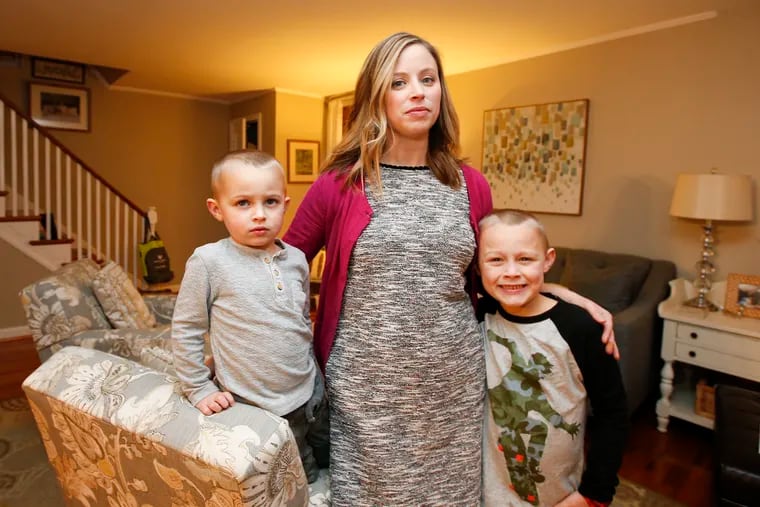 Allyson Groff with her sons, Owen, 7, (right) and Rhys, 3 inside their Havertown home on Thursday, Jan. 24, 2019.  Allyson is a parent whose two children utilize Family Support Services, which provides child care to Haverford School District. If FSS leaves the district, she will have to scramble to find care.