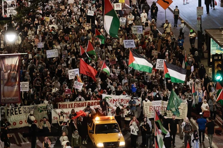 Pro-Palestinian protesters march in Center City ahead of the presidential debate blocks away at the National Constitution Center.