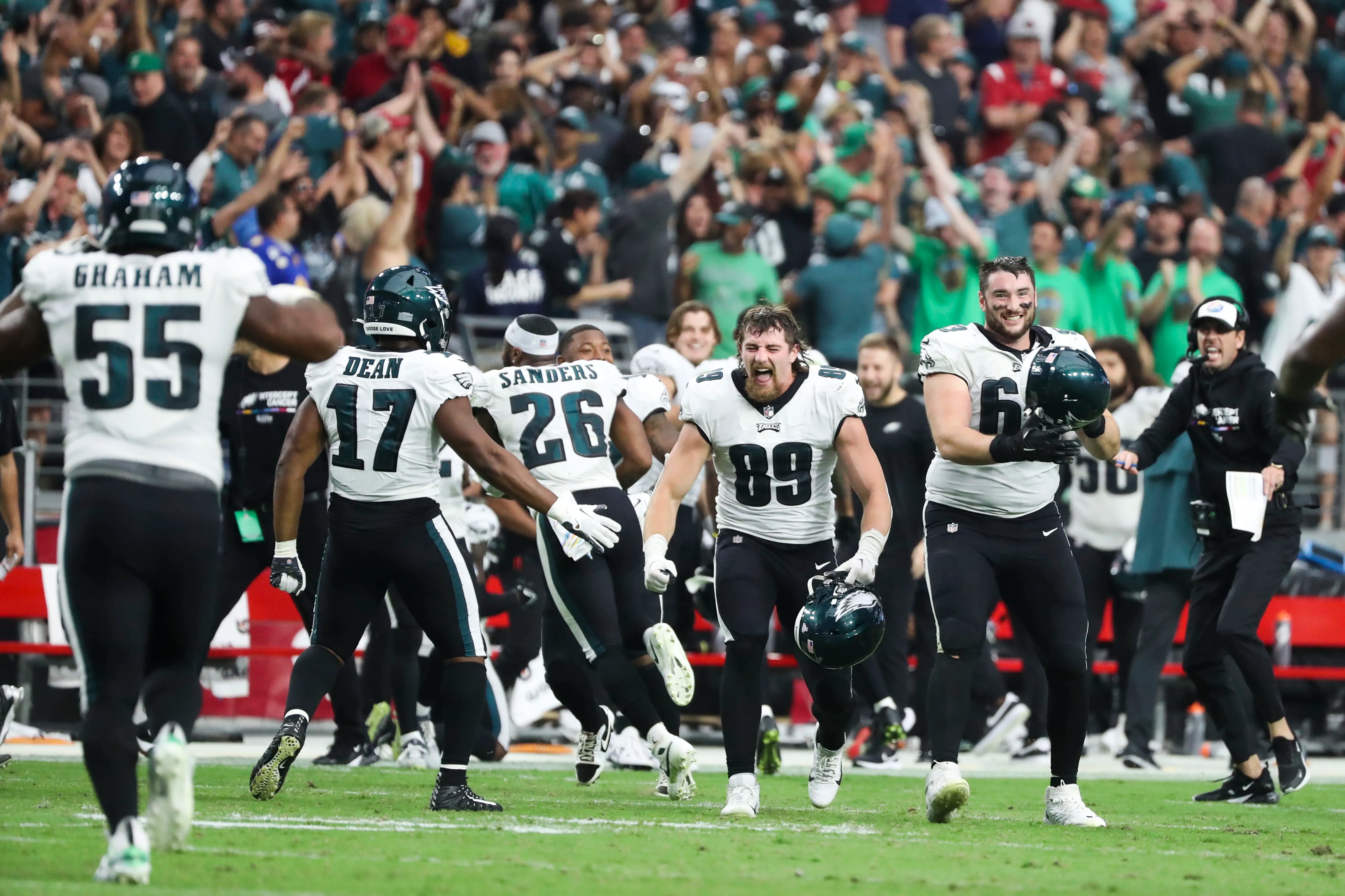 Arizona Cardinals vs. Philadelphia Eagles. Fans support on NFL Game.  Silhouette of supporters, big screen with two rivals in background Stock  Photo - Alamy