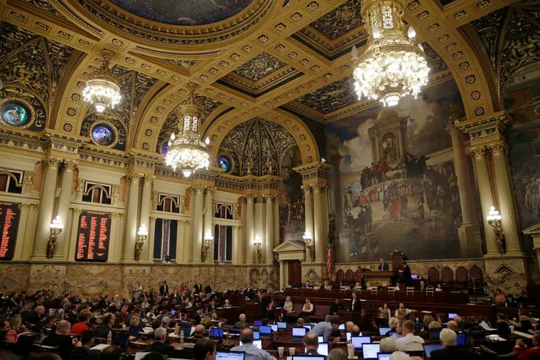 Members of the Pennsylvania House of Representatives debate, Wednesday, Oct. 7, 2015, at the state Capitol in Harrisburg, Pa. Gov. Tom Wolf's tax proposal is being debated in the state House of Representatives in the first-term Democrat's effort to break Pennsylvania's 3-month-old budget impasse. (AP Photo/Matt Rourke)