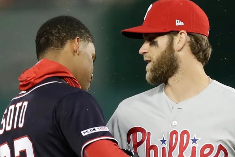 The Phillies' Bryce Harper, right, and Washington Nationals right fielder Juan Soto are two of the best players in the National League East.