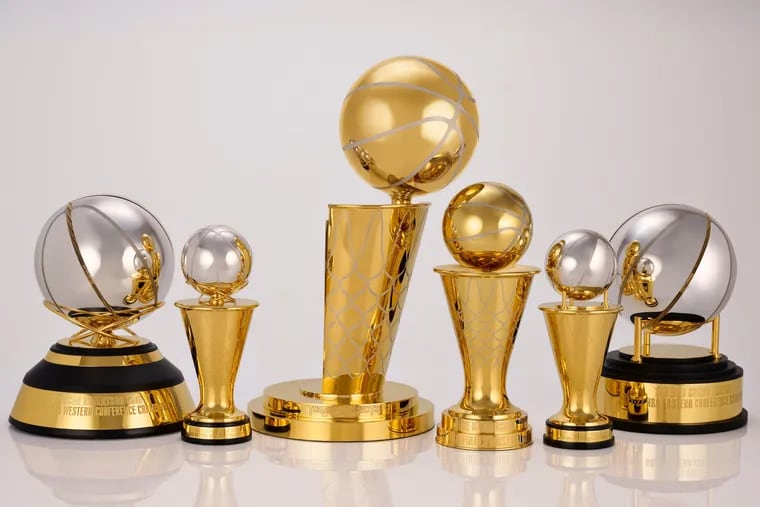 This photo provided by the NBA shows a group of trophies.