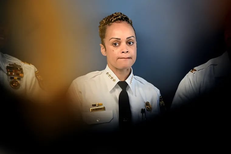 Phila. Police Commissioner Danielle Outlaw stands as other police officials speak during a press conference at Police Headquarters after Saturday’s mass shooting on South Street. She said “Yesterday was a dark day for Philadelphia.”