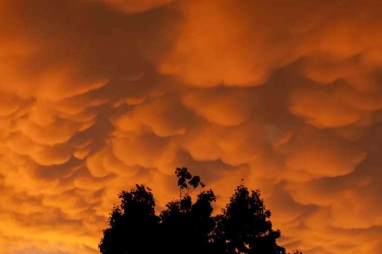 Mammatus clouds are seen during the sunset in Philadelphia on Sunday.