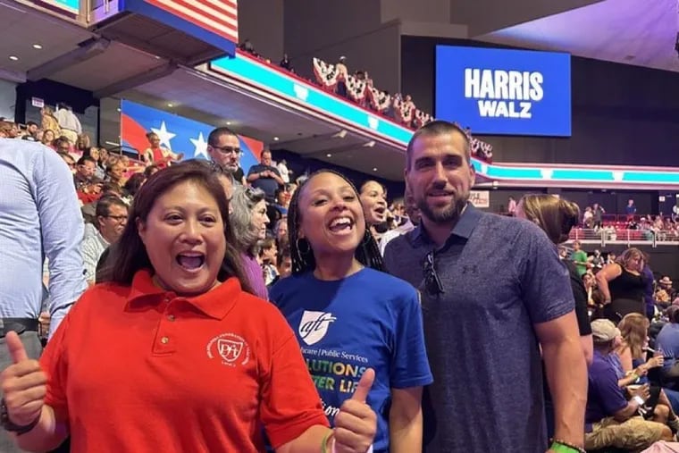 Philadelphia teachers (L-R) Antoinette Calimag, Leyla Lindsay and Luke Dougan celebrate at the Harris-Walz appearance at Temple University this week.