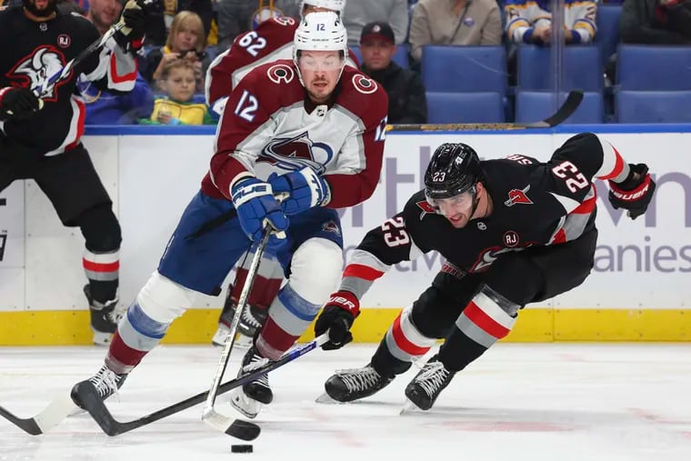 Ryan Johansen (left), playing last season for the Colorado Avalanche, has said he cannot play hockey because of a hip injury.