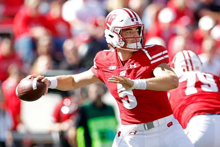 Wisconsin quarterback Graham Mertz, a two-year starter, won't play for the Badgers in Tuesday's bowl game against Oklahoma State after opting to transfer. (Photo by John Fisher/Getty Images)