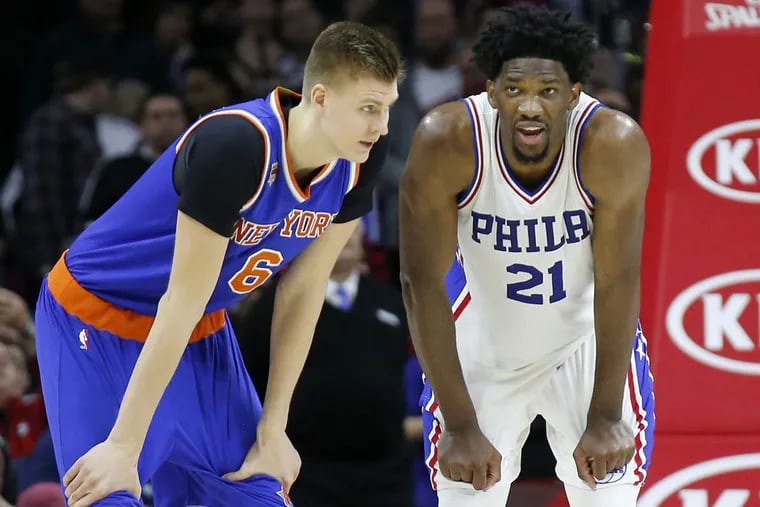 The Knicks’ Kristaps Porzingis, next to the Sixers’ Joel Embiid during a January game.