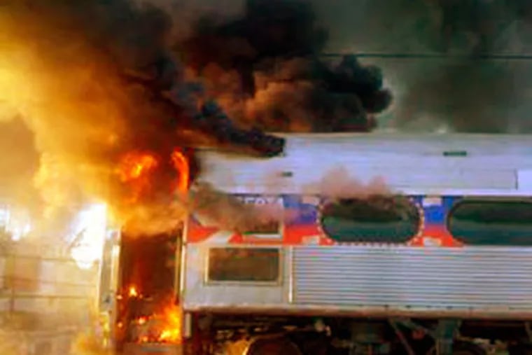 An R5 regional rail train caught fire this morning. (AP Photo/Wayne Rafferty)