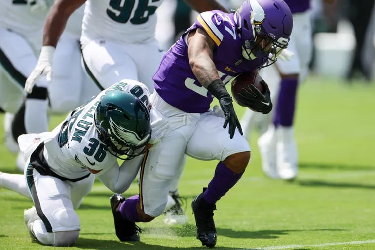 Philadelphia Eagles safety Tristin McCollum brings down Minnesota Vikings running back Myles Gaskin as he picks up the first down during the first quarter.