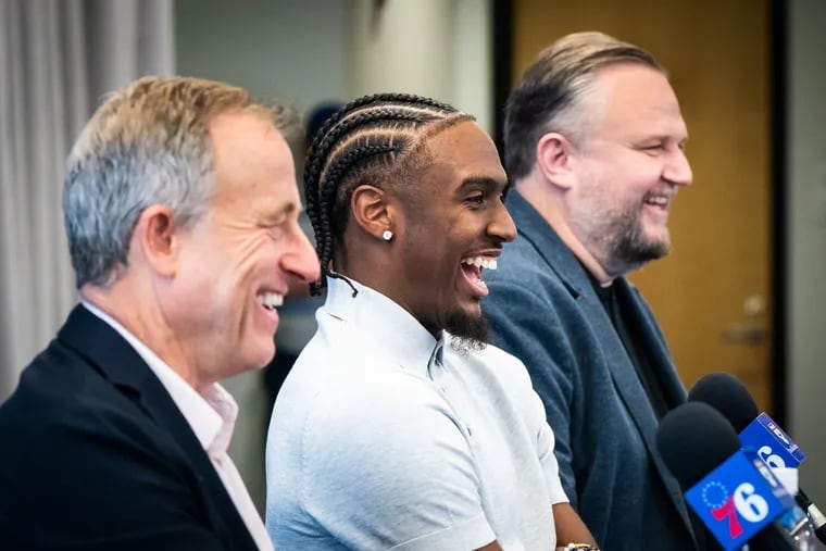 Tyrese Maxey (center), flanked by Sixers managing partner Josh Harris and president of basketball operations Daryl Morey, recently signed a five-year, $204 million extension.