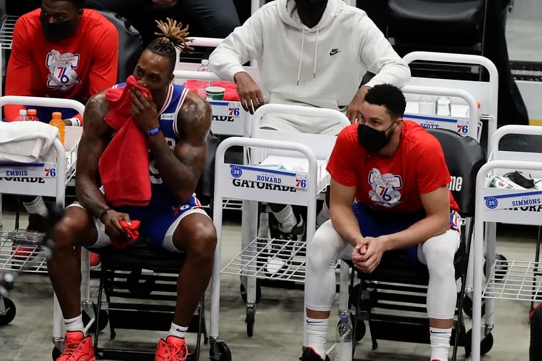 Sixers guard Ben Simmons and center Dwight Howard on the bench late in the third quarter against the Washington Wizards in Game 4 of their first round NBA playoff series in Washington D.C., on Monday, May 31, 2021.