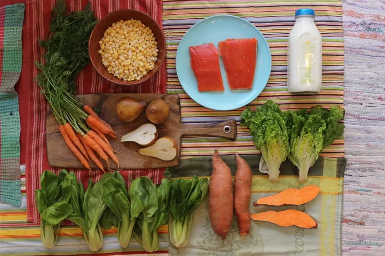 A typical share from Greensgrow Farms' winter CSA including meat, dairy, fruit, and vegetables.