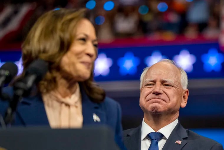 Vice President Kamala Harris and her running mate, Minnesota Gov. Tim Walz, at a rally at Temple University's Liacouras Center in Philadelphia earlier this month. Walz will speak at the DNC Wednesday night.