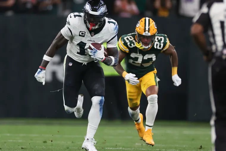 Eagles wide receiver A.J. Brown runs with the football past Green Bay Packers cornerback Jaire Alexander during the second quarter in the season opener at Corinthians Arena in São Paulo, Brazil on Friday, Sept. 6, 2024.