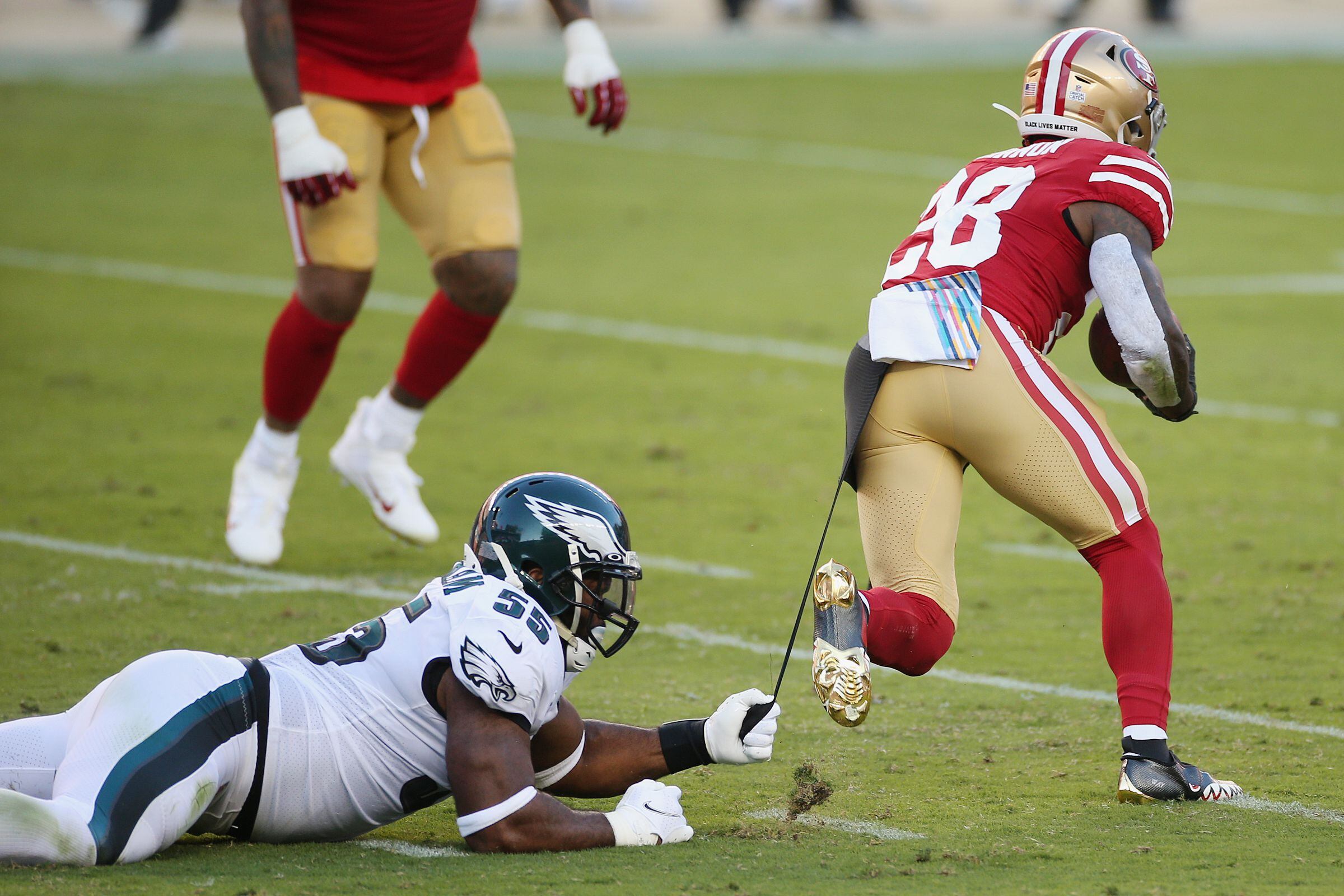 Philadelphia Eagles' Cre'Von LeBlanc had a little trouble with George  Kittle, but forces key turnover