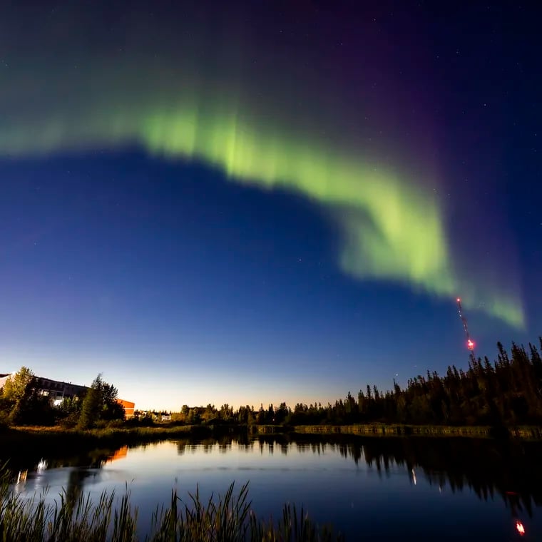 The northern lights, or the aurora borealis, appear in the sky over Rat Lake in Yellowknife in Canada's Northwest Territories last month. The solar storms that ignite the aurora were especially plentiful in August.