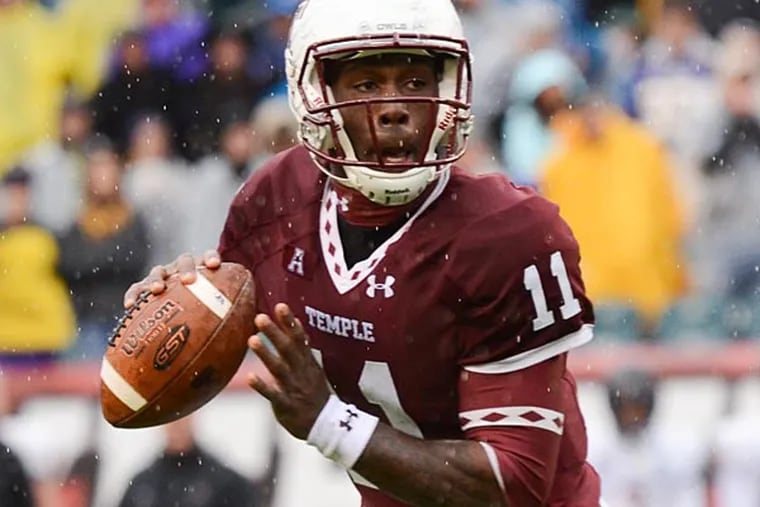 Temple quarterback P.J. Walker scrambles to his right during the third quarter of Temple's 20-10 upset win over East Carolina on Saturday, Nov. 1, 2014 at Lincoln Financial Field. (Andrew Thayer/Staff Photographer)