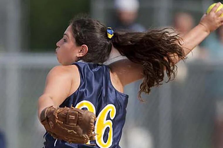 St. Pius’ Denise Haines winds up against Kennedy-Kenrick at Spring-Ford. The 9-3 win by the Dickinson recruit advances the Lions to a PIAA Class AA quarterfinal Thursday. (Ed Hille/Staff Photographer)
