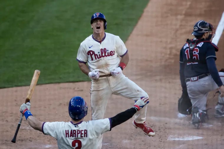 Philadelphia Phillies - J.T. Realmuto and Bryce Harper celebrating