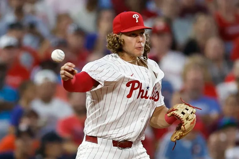 Phillies third baseman Alec Bohm firing to first base against the Astros on Aug. 26.