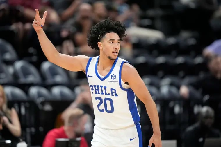 Sixers rookie forward Jared McCain (20) celebrates after scoring during a recent summer league game.