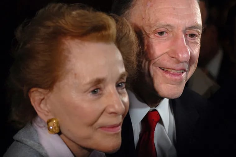 U.S. Sen. Arlen Specter arrives with his wife, Joan Levy Specter, at his polling place to vote in the primary election on May 18, 2010.