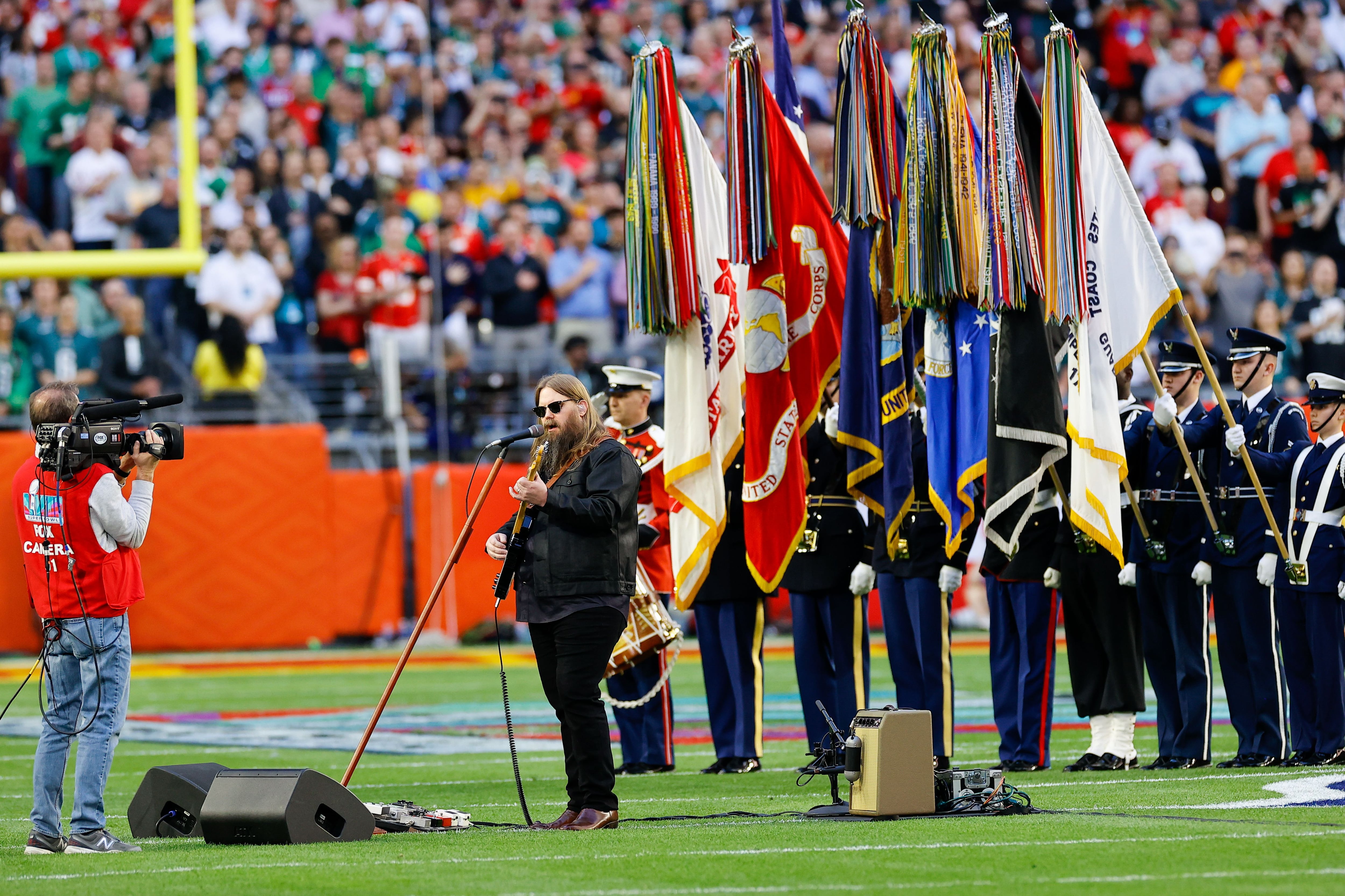 Phoenix, USA. 12th Feb, 2023. Chris Stapleton performs the National Anthem  ahead of Super Bowl LVII between the Philadelphia Eagles and the Kansas  City Chiefs held at State Farm Stadium in Phoenix