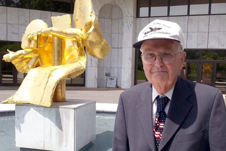 Earl G. Russell was named a Chevalier in the French Legion of Honor for his role in liberating France during World War II.  He is seen outside the French Embassy in Washington.