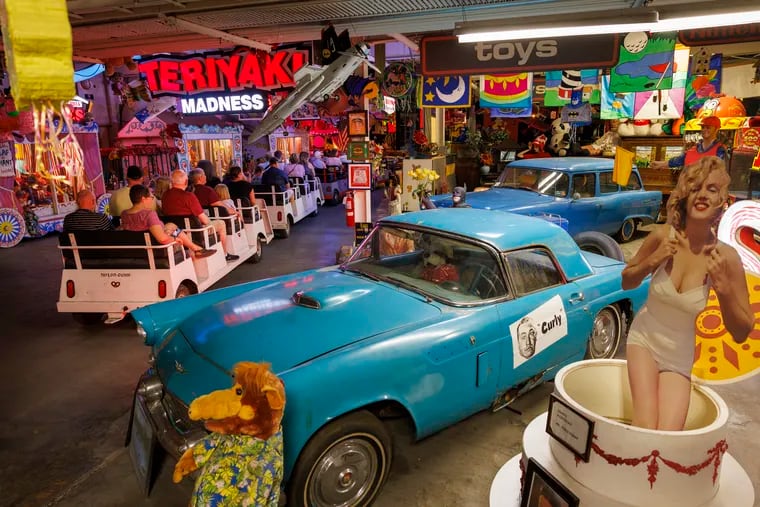 A tram takes visitors on a ride through the large collection of nostalgic memorabilia on display in the Toy Box at the American Treasure Tour Museum in Oaks, Pa.