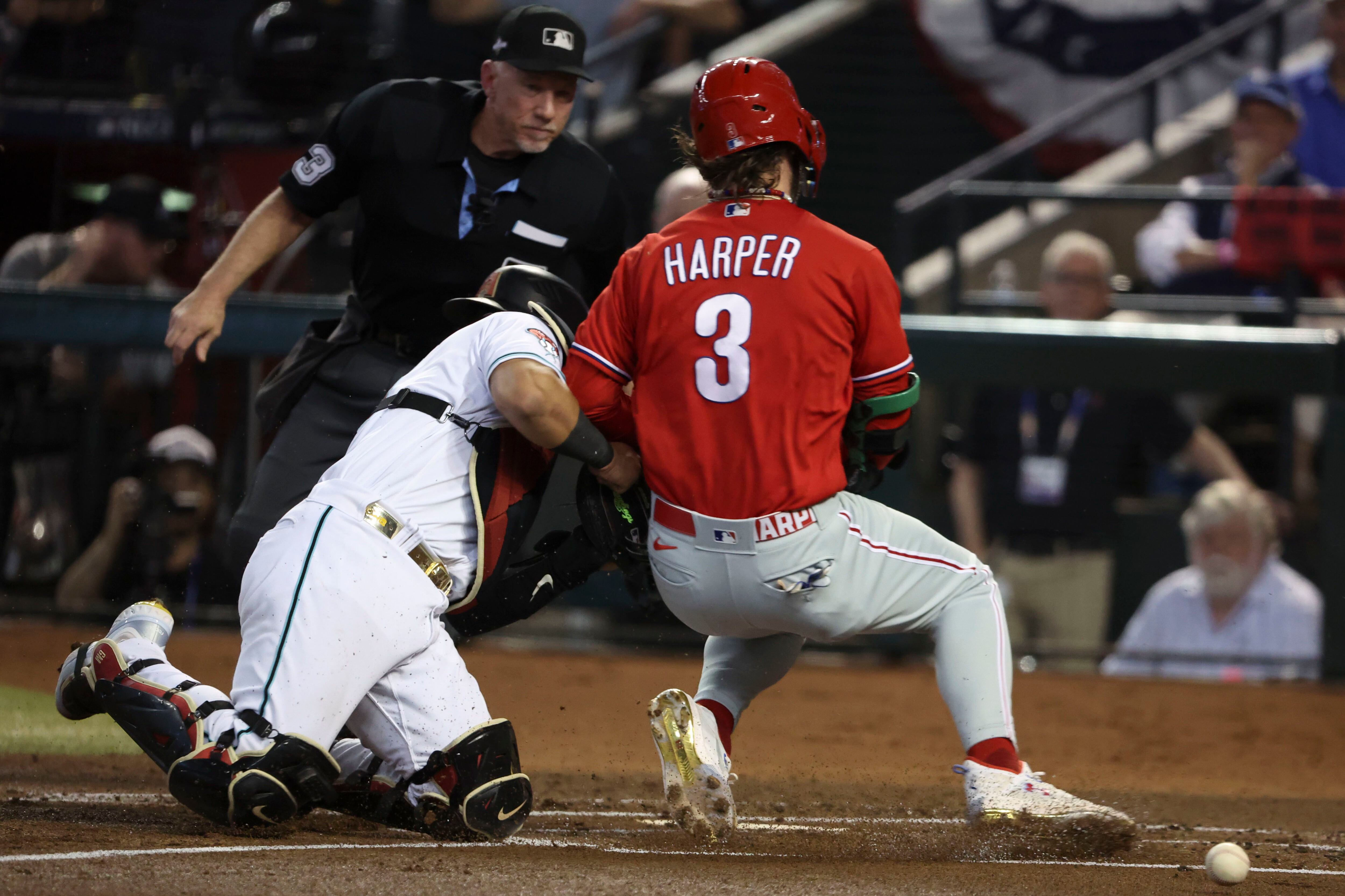 Bryce Harper stares down Michael Phelps after homer, steals home