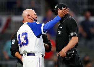 Why Phillies' Joe Girardi believes moving plate umpire behind pitcher is  better than robo umps 