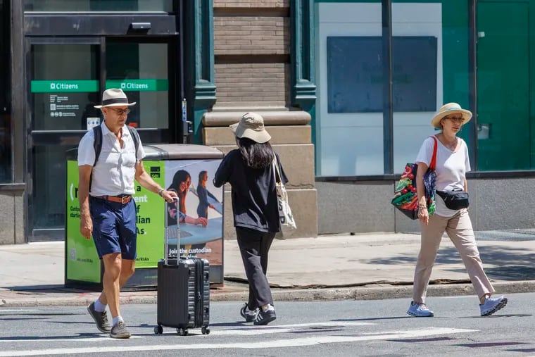 It's hats on a hot and sunny July day in Center City. The June1 -July 31 period has been among the warmest on record and more heat is due with the arrival of August.