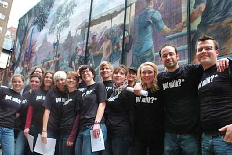 A group of teachers from the Independence Charter School in front of a mural that depicts gay-rights events in the 1960s in Philadelphia. The instructors “called out gay” to join a national protest against California’s Proposition 8 gay-marriage ban. (Sarah J. Glover / Staff Photographer)