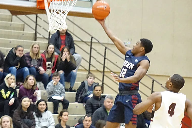 Penn's Devon Goodman goes for a layup during Friday night's Ivy League game against Brown.