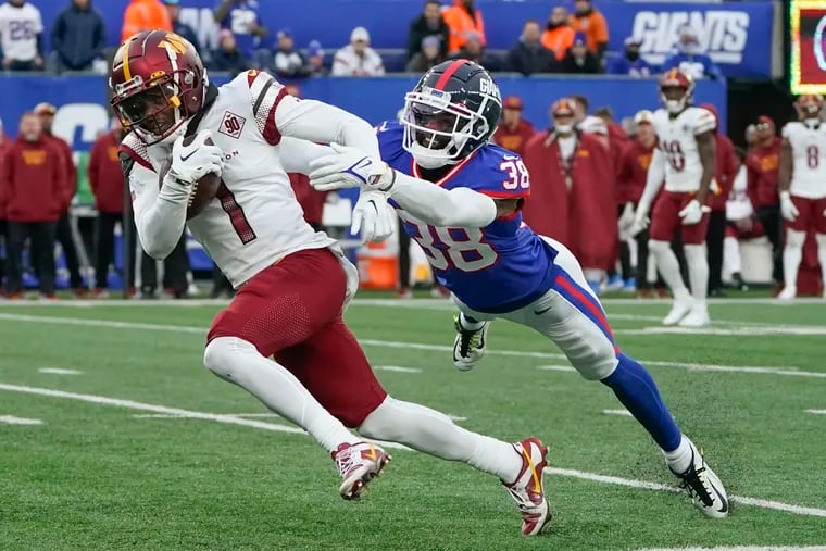 Jahan Dotson, left, has caught 11 touchdowns in two NFL seasons.