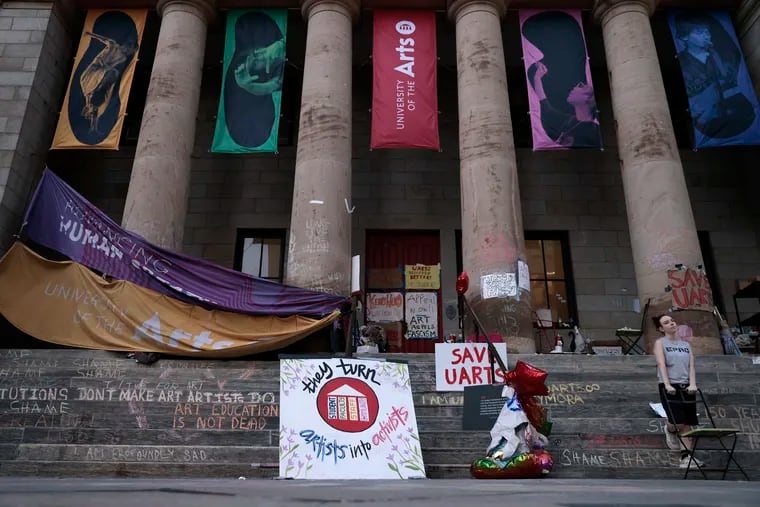 Students are shown outside Hamilton Hall at the University of the Arts in this June 7 file photo. The university, now closed, has filed for bankruptcy.