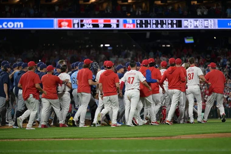 The benches clear after the Phillies' Nick Castellanos was hit by a pitch by the Rays' Edwin Uceta during the eighth inning on Tuesday.