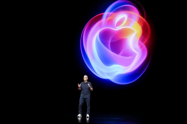 Apple CEO Tim Cook talks on the stage during an announcement of new products at Apple headquarters on Monday, Sept. 9, 2024.