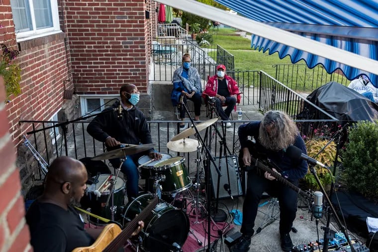 Bassist Anthony Tidd, drummer Anwar Marshall and guitarist Tim Motzer perform at Orrin Evans weekly home-based jazz concert known as Club Patio in Northwest Philadelphia during warmer weather.  Many entrepreneurs have started home-based businesses during the pandemic.